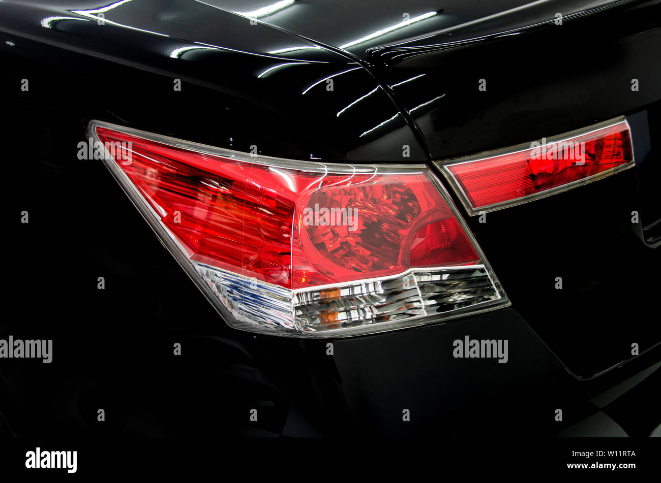 Luxury car tail light on a black background Stock Photo Alamy