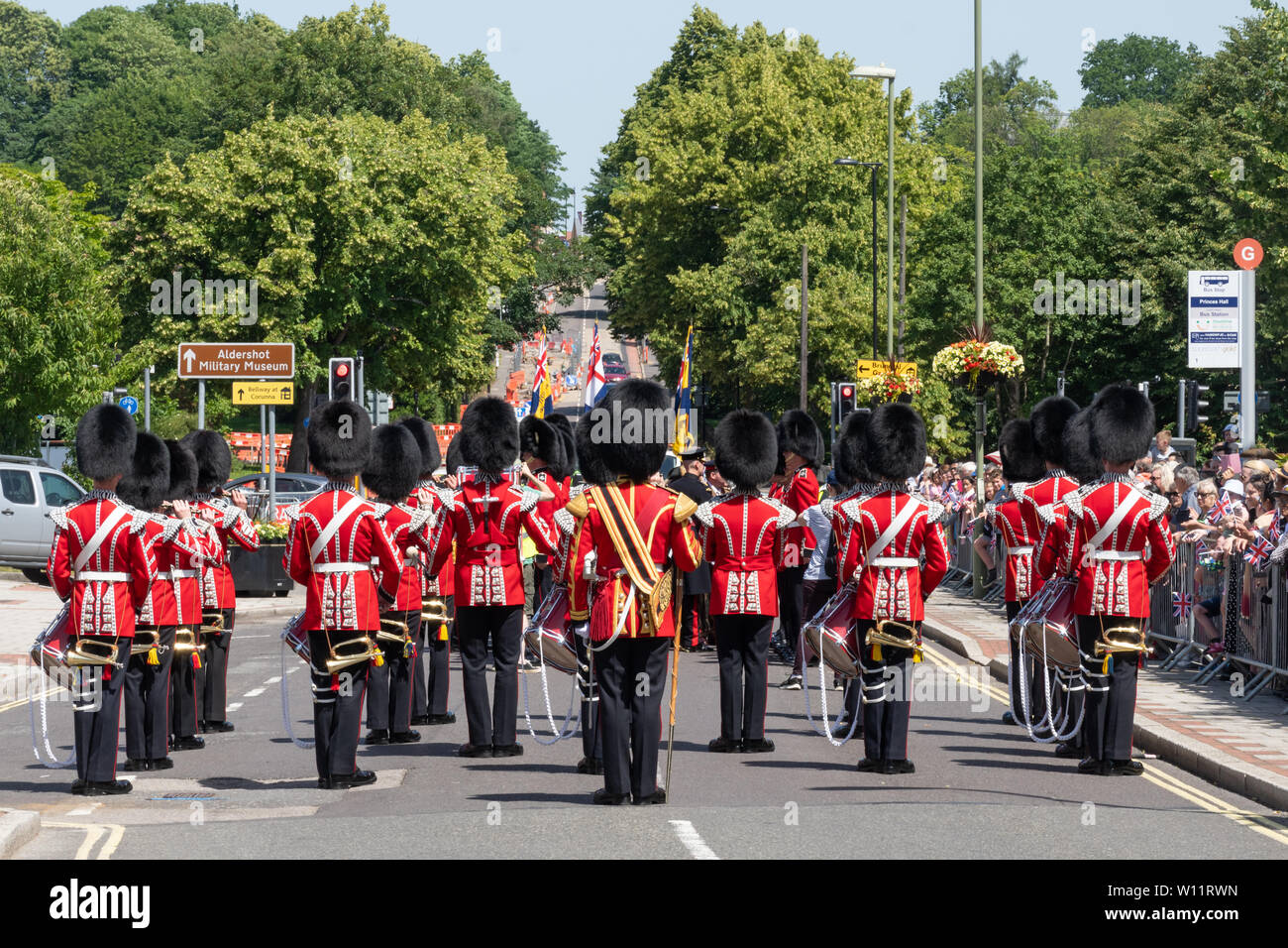 The Grenadier Guards parade around Aldershot town in Hampshire, UK, in