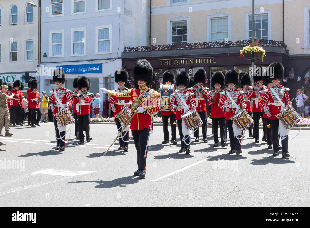 The Grenadier Guards parade around Aldershot town in Hampshire, UK, in