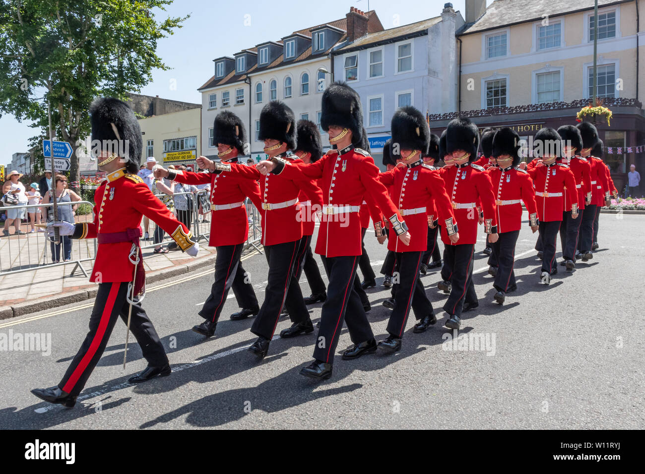The Grenadier Guards parade around Aldershot town in Hampshire, UK, in