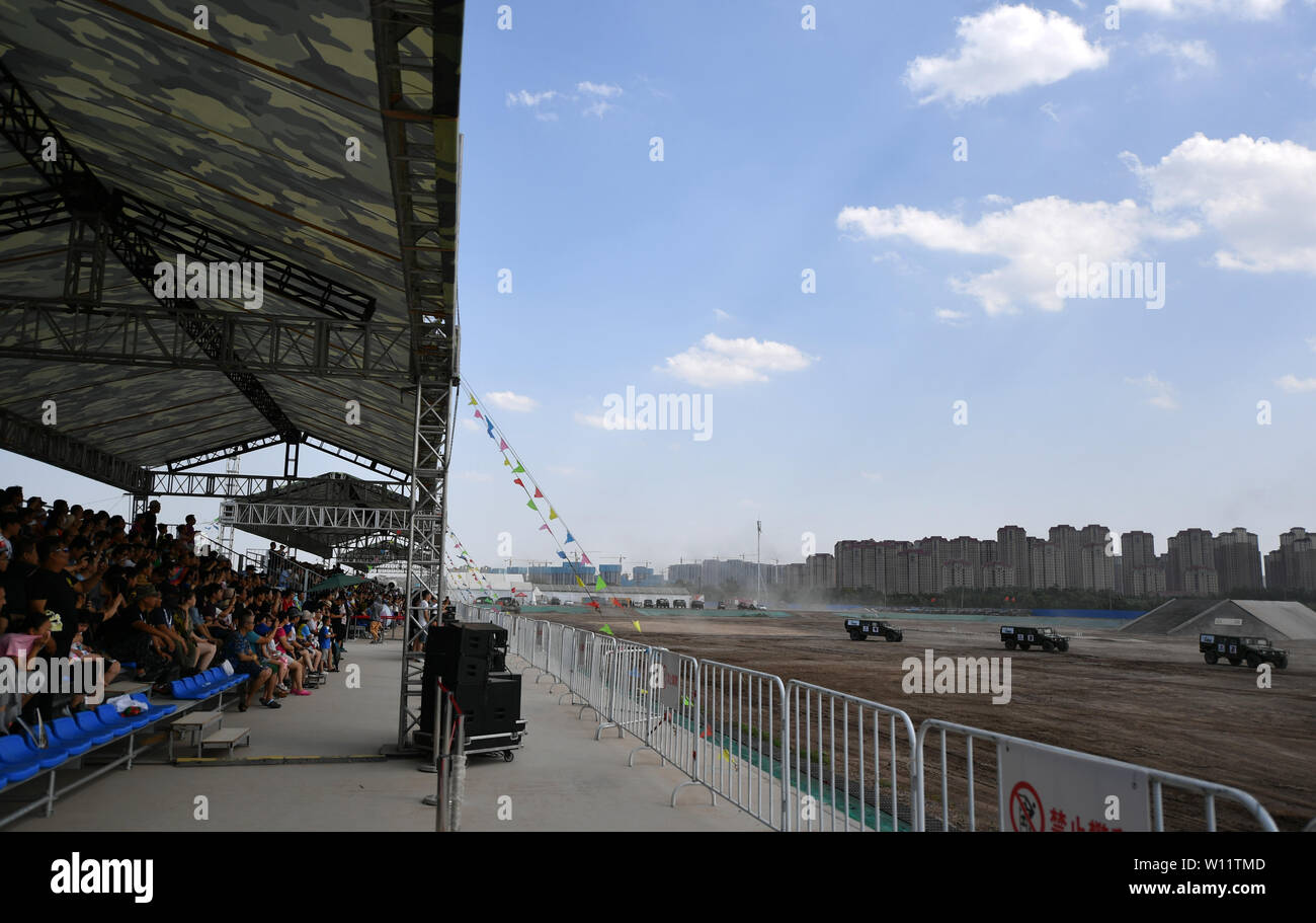 Tianjin, China. 29th June, 2019. People watch the performance during the Defence Vehicle and Equipment Exhibition in north China's Tianjin, June 29, 2019. Credit: Li Ran/Xinhua/Alamy Live News Stock Photo