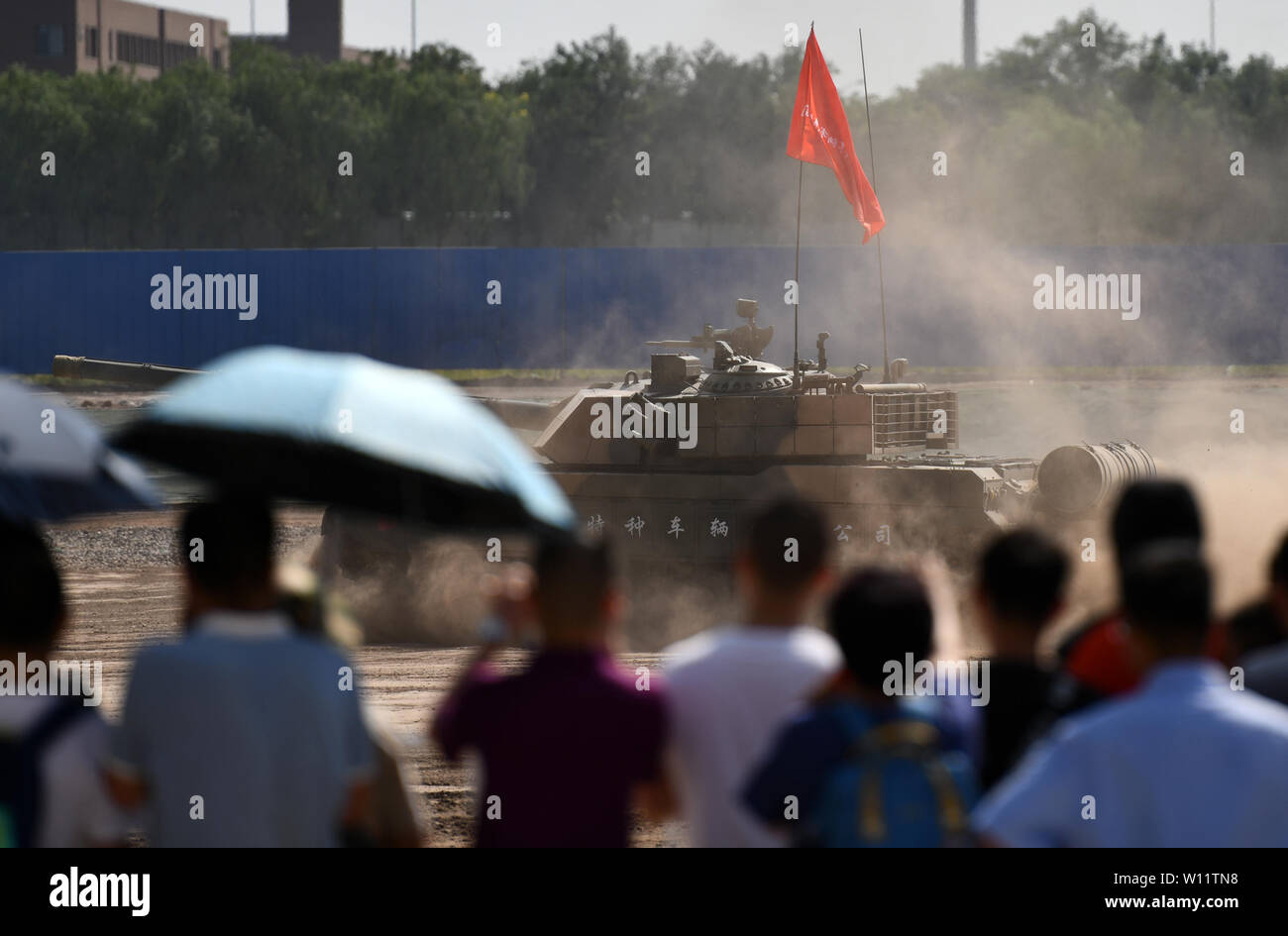 Tianjin. 29th June, 2019. People watch the performance during the Defence Vehicle and Equipment Exhibition in north China's Tianjin, June 29, 2019. Credit: Li Ran/Xinhua/Alamy Live News Stock Photo