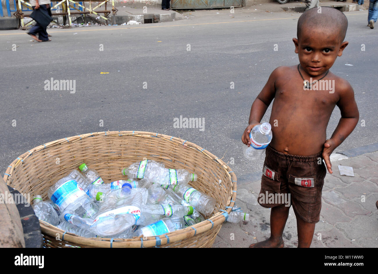 Bangladeshi workers dries reject plastic bag in Dhaka, Bangladesh Stock
