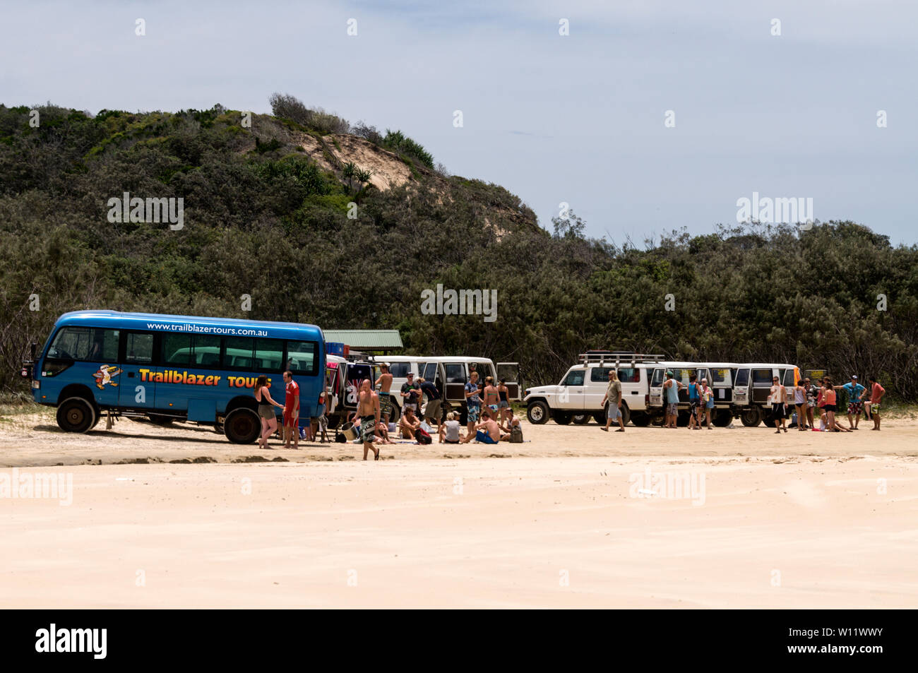 A party of young travellers taking a break close to the 75 mile long Sandy Highway on Fraser Island, Queensland, Australia  Fraser Island is a World H Stock Photo