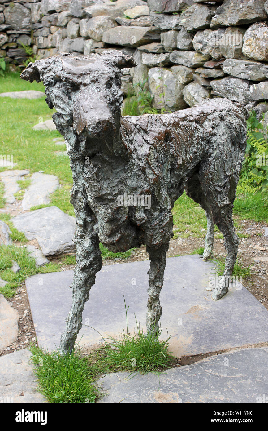 Bronze Sculpture of Gelert near Gelert's Grave at Beddgelert in the Snowdonia National Park, Gwynedd, Wales Stock Photo