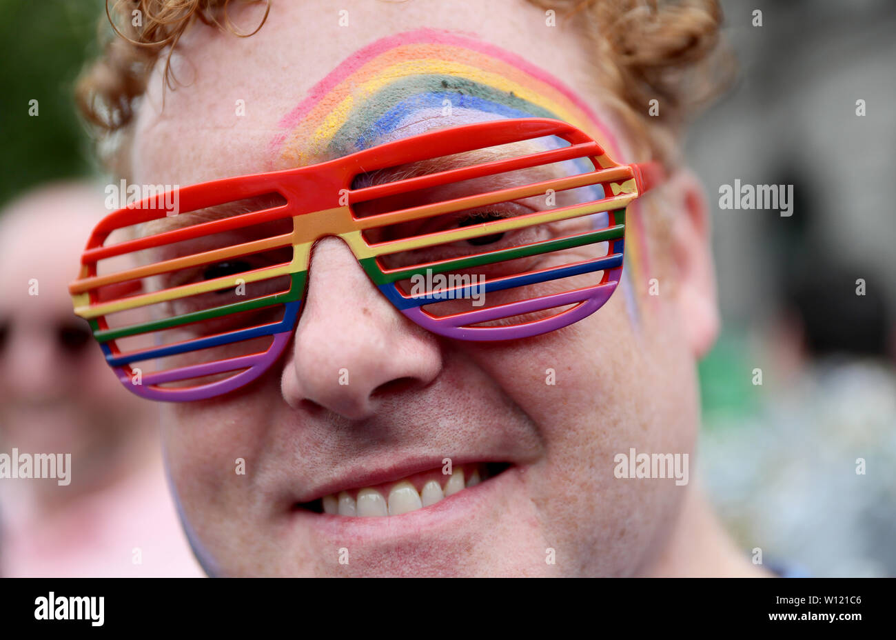 People take part in the Pride parade in Dublin. Stock Photo