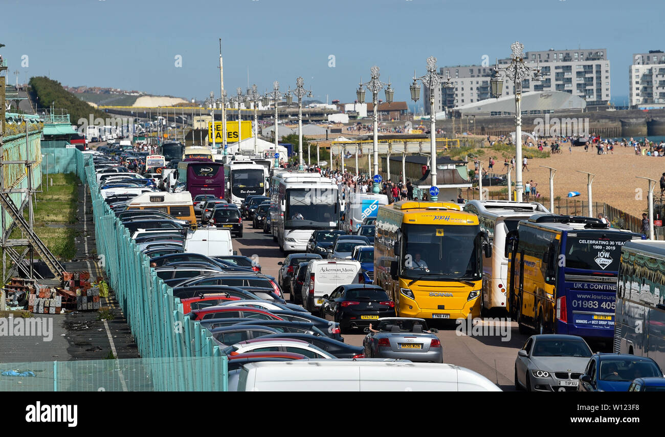 Brighton UK 29th June 2019 -  Traffic jams on Brighton seafront as crowds flock to the beach as Britain swelters in the heatwave sunshine with some areas of the south east forecast to reach over 30 degrees  . Credit : Simon Dack / Alamy Live News Stock Photo