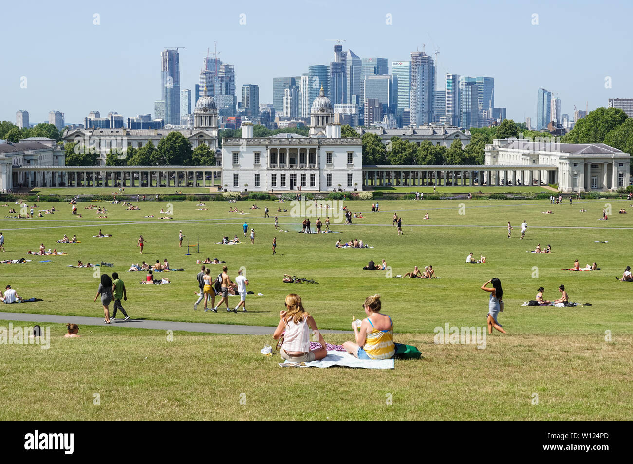 People enjoying hot and sunny day in Greenwich Park in London, England, United Kingdom, UK Stock Photo