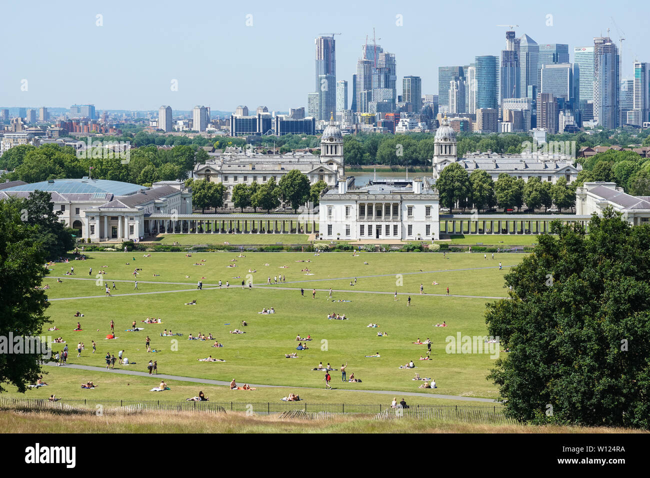 People enjoying hot and sunny day in Greenwich Park, London, England, United Kingdom, UK Stock Photo