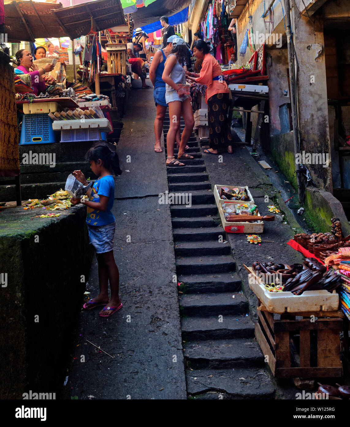 Tourists Shopping On The Steps On Ubud Grand Market Bali Indonesia Stock Photo Alamy