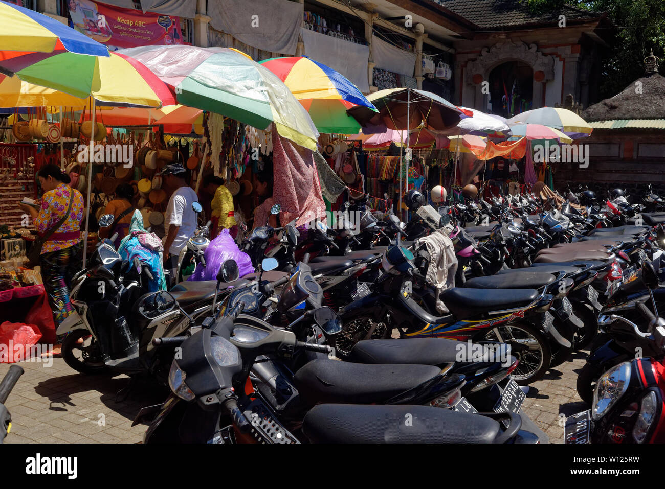 Motorbike parked in the old craft market in Ubud, Bali, Indonesia Stock Photo