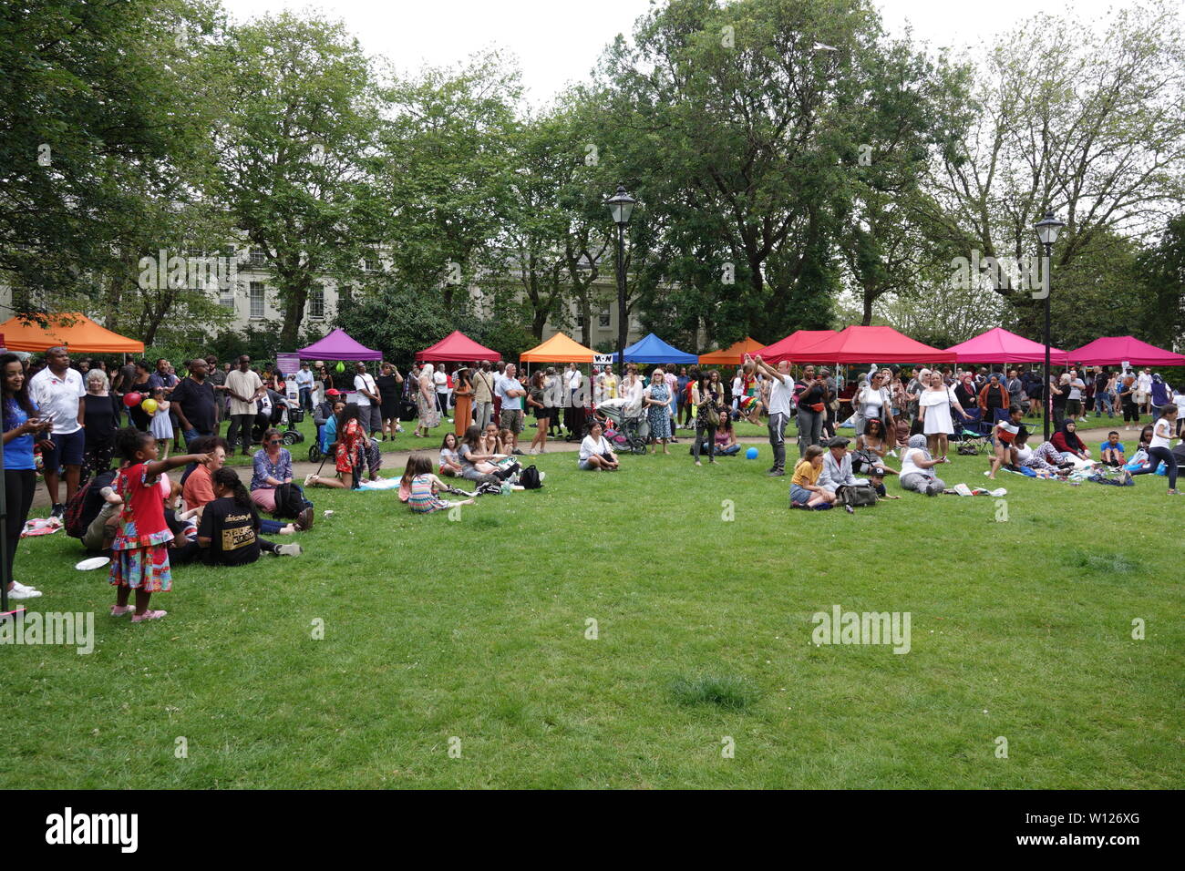 Liverpool, UK. 29th June, 2019. Celebrating Liverpool's Windrush generation at a community family fun day event in Faulkner Square Park, Toxteth, Liverpool with performances from Carroll Thompson and local poet Levi Tafari. Credit: ken biggs/Alamy Live News Stock Photo