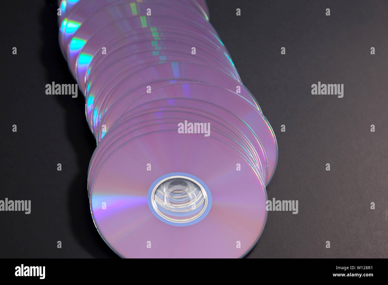 collection of old cds or dvds in a row Stock Photo Alamy