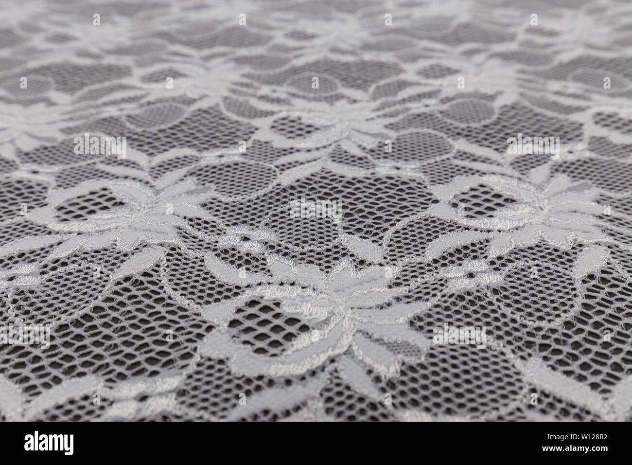 Beautiful close up of lace fabric with textile texture background Stock Photo