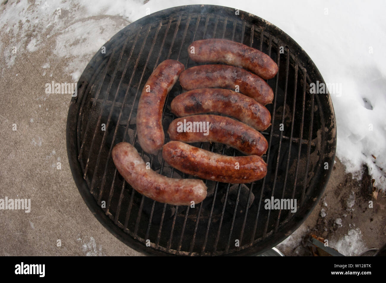 Seven Brats on a Small Charcoal Grill Stock Photo Alamy
