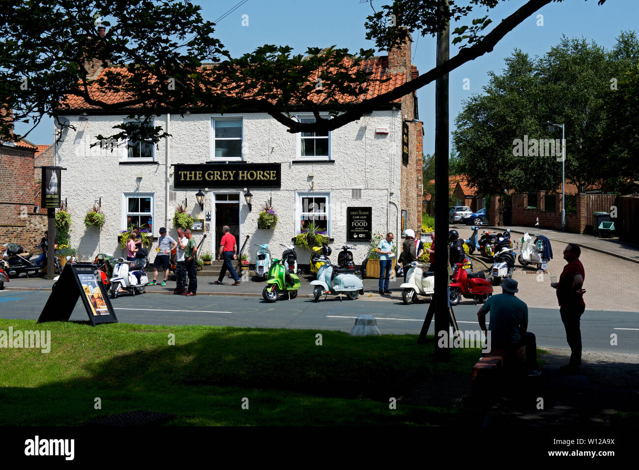 Scooter riders gathering at the Grey Horse pub in Elvington, North Yorkshire, England UK Stock Photo