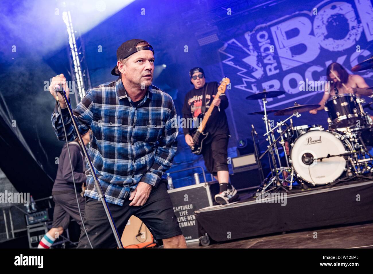 24.06.2019, the American hard-rock band Ugly Kid Joe live at the Kieler  Woche on the stage of the RADIO BOB! ROCKCAMP on the Reventlou meadow.  Sanger and frontman Whitfield Crane in action.