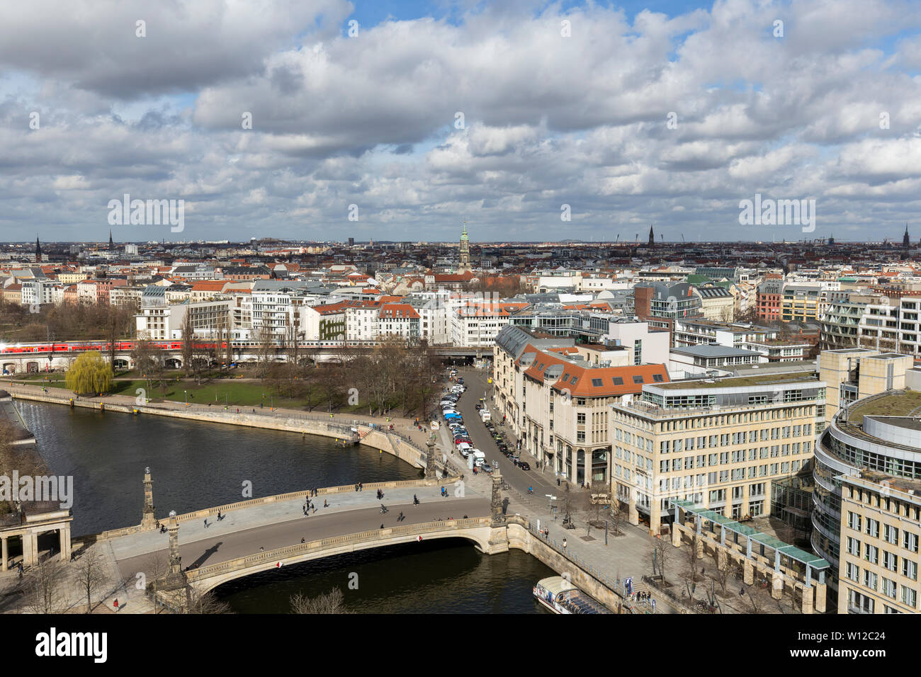 Spree River and buildings in Mitte district at the downtown Berlin, Germany, viewed from above on a sunny day in the early spring. Stock Photo