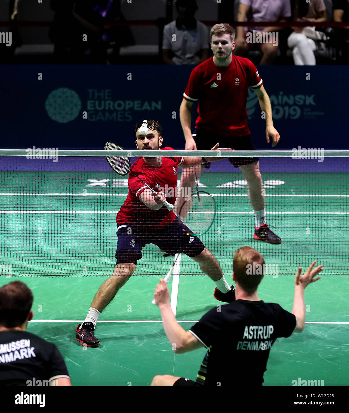 Great Britain's Marcus Ellis (right) and Chris Langridge on their way to  winning gold medals after winning the Mens Doubles Badminton Final against  Denmark's Kim Astrup and Anders Rasmussen, during day nine