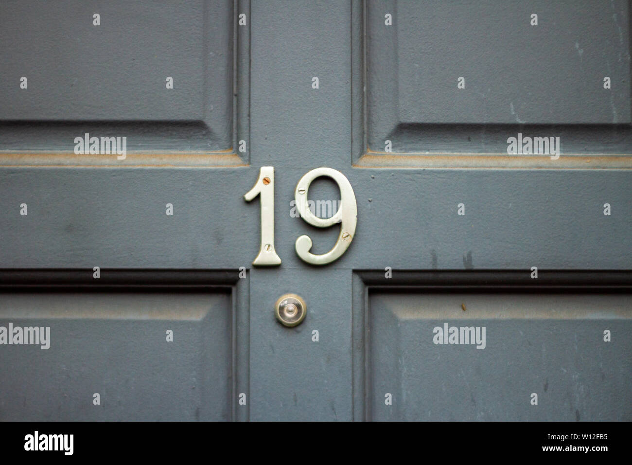 House number nineteen with the 19 in silver Stock Photo