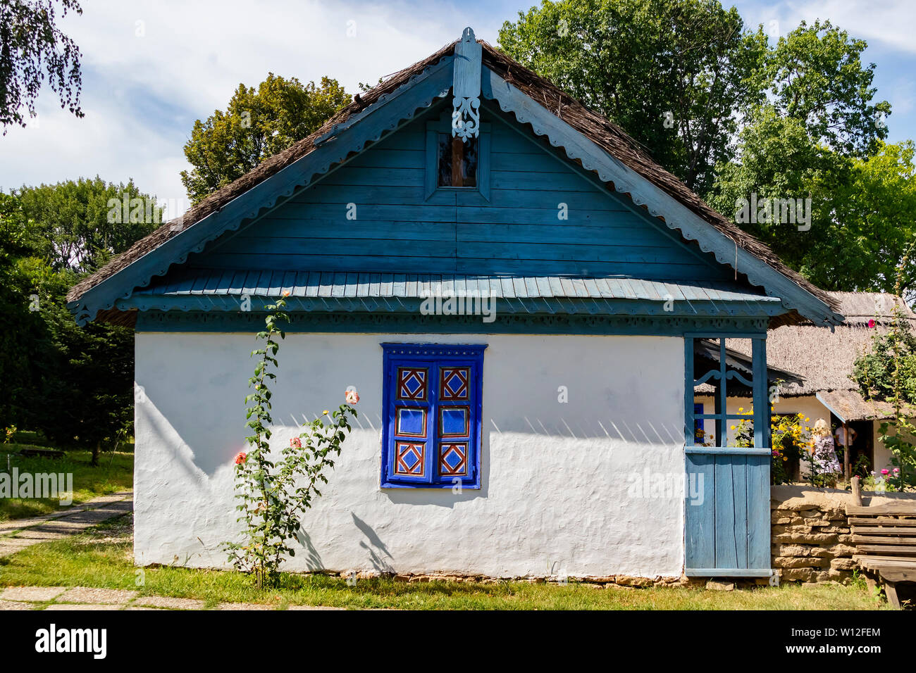 Bucharest, Romania - August 15th, 2018: A traditional romanian country house in Dimitrie Gusti National Village Museum Stock Photo