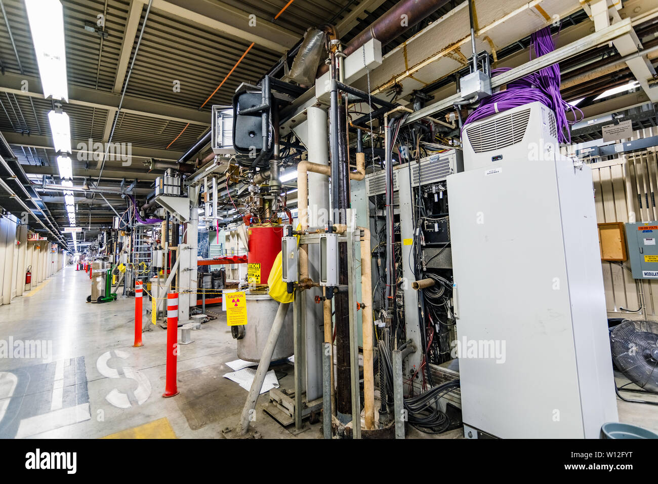 June 21, 2019 Menlo Park / CA / USA - SLAC National Accelerator Laboratory's 'Klystron Gallery' inside view; the Klystron Gallery is the nearly 2-mile Stock Photo