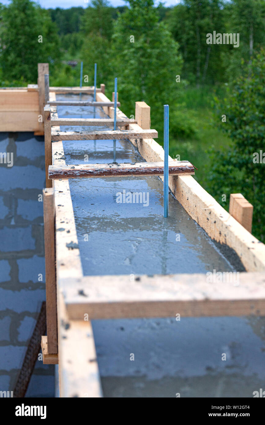 Foundation site of new house, building, details and reinforcements with steel bars Stock Photo