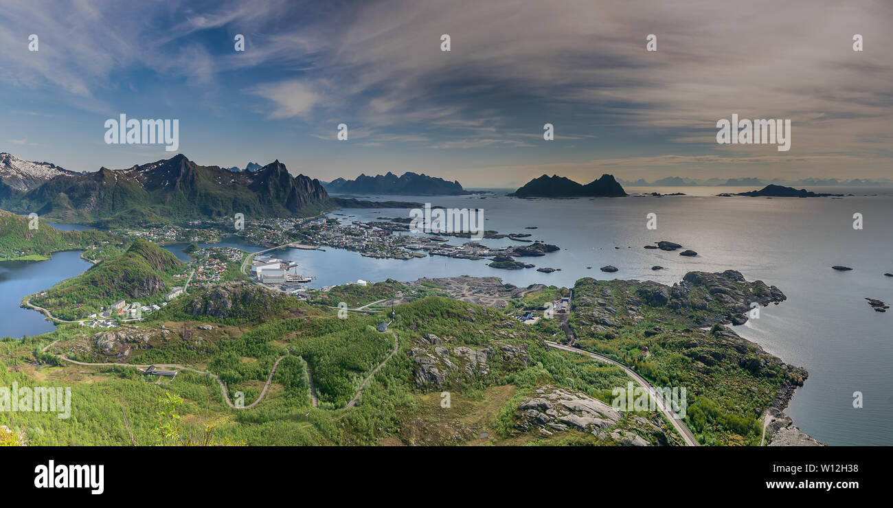 A panoramic view of the city of Svolvaer and the beautiful mountains and coastline that surround it, as seen from atop Tjeldbergtind peak. Stock Photo