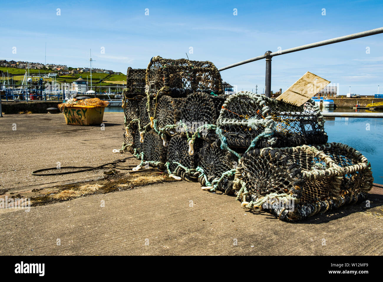 lobster pots on whitehaven harbour Stock Photo Alamy