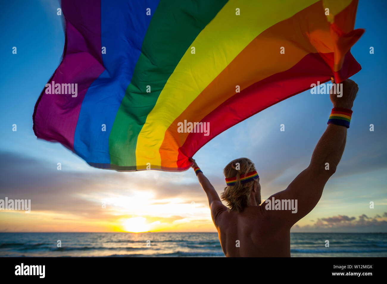 Silhouette Of Man With Blond Hair Wearing Lgbtqi Pride Headband