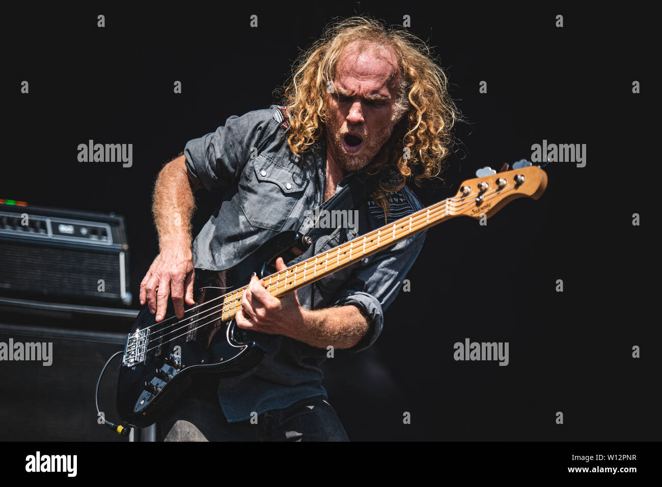 Mike Dean, bassist of the American heavy metal band Corrosion Of Conformity, performing live on stage in Bologna, at the Bologna Sonic Park 2019 first Stock Photo