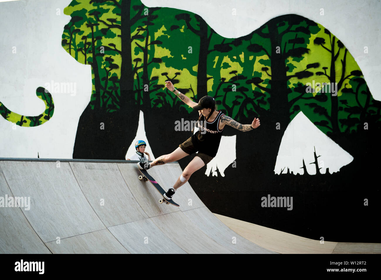 Glastonbury, Pilton, Somerset, UK. 28th June 2019. Female skateboarders  skate and teach others at the ramp in Greenpeace Field of Glastonbury  Festival on Friday 28th June 2019. Credit: Female Perspective/Alamy Live  News