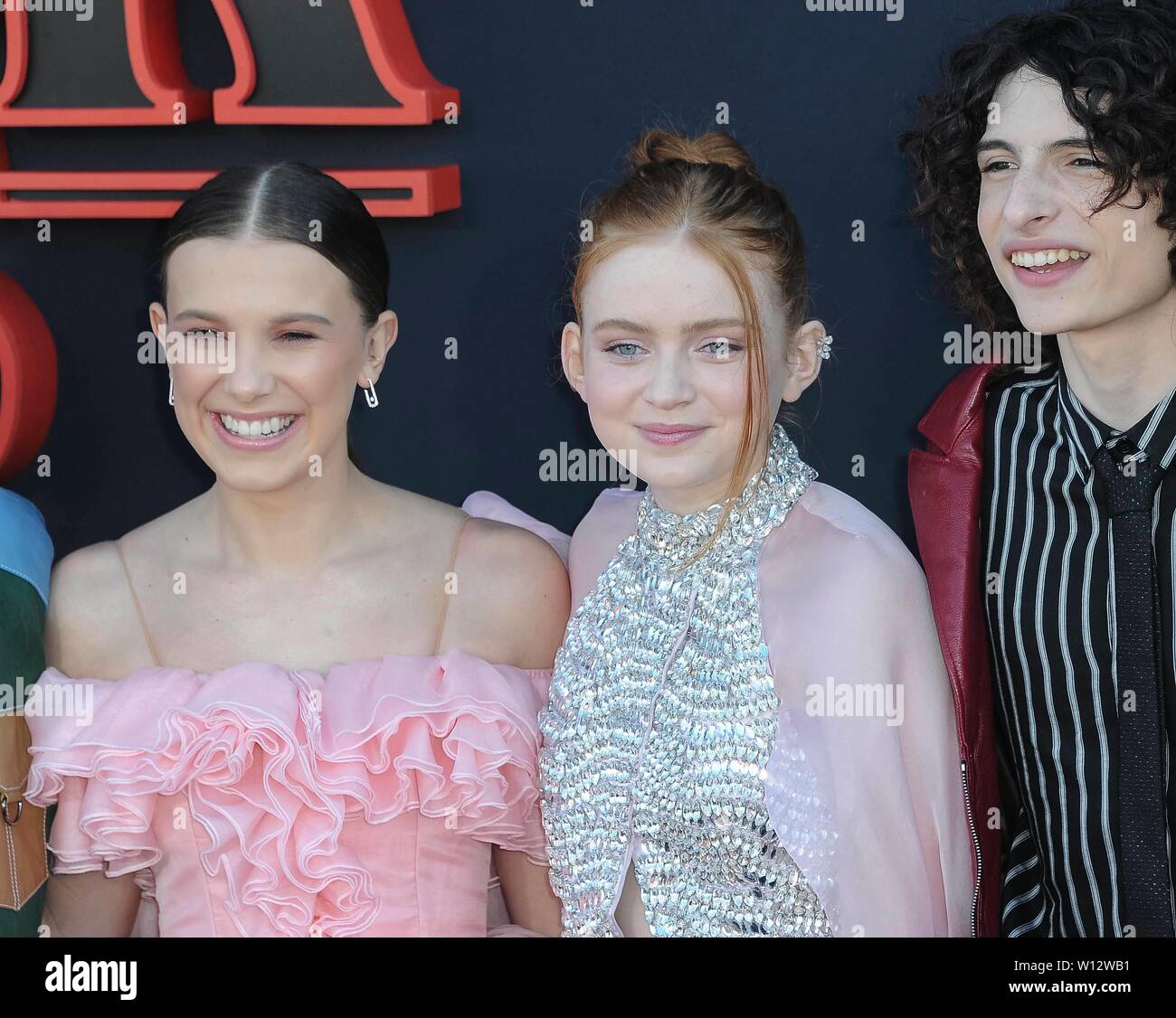 Millie Bobby Brown L R Sadie Sink And Finn Wolfhard Attend The