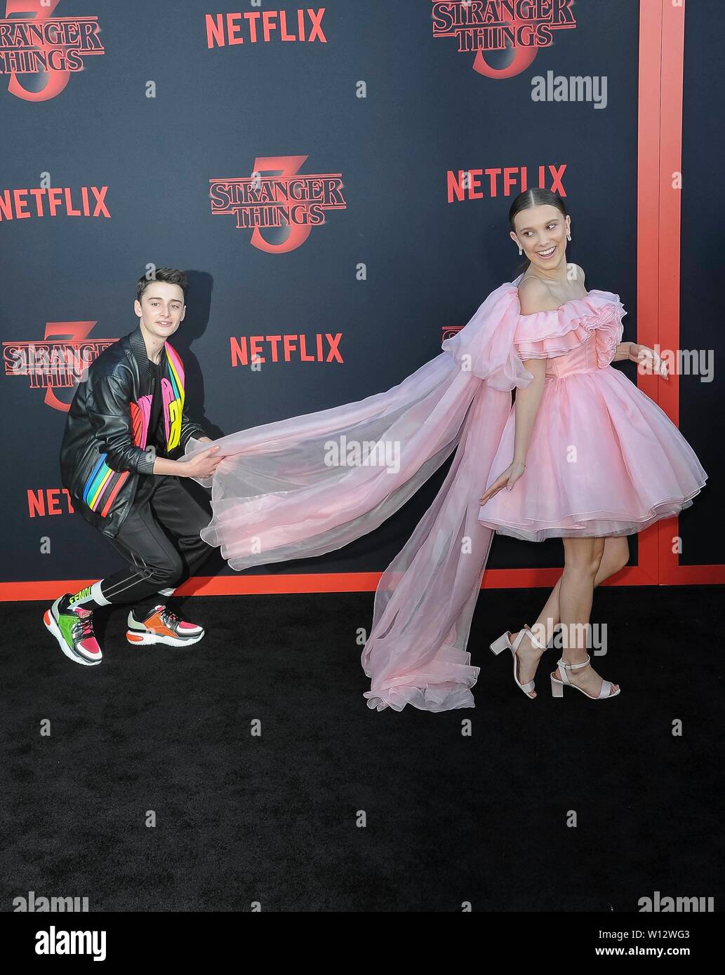 Noah Schnapp L And Millie Bobby Brown Attend The Stranger
