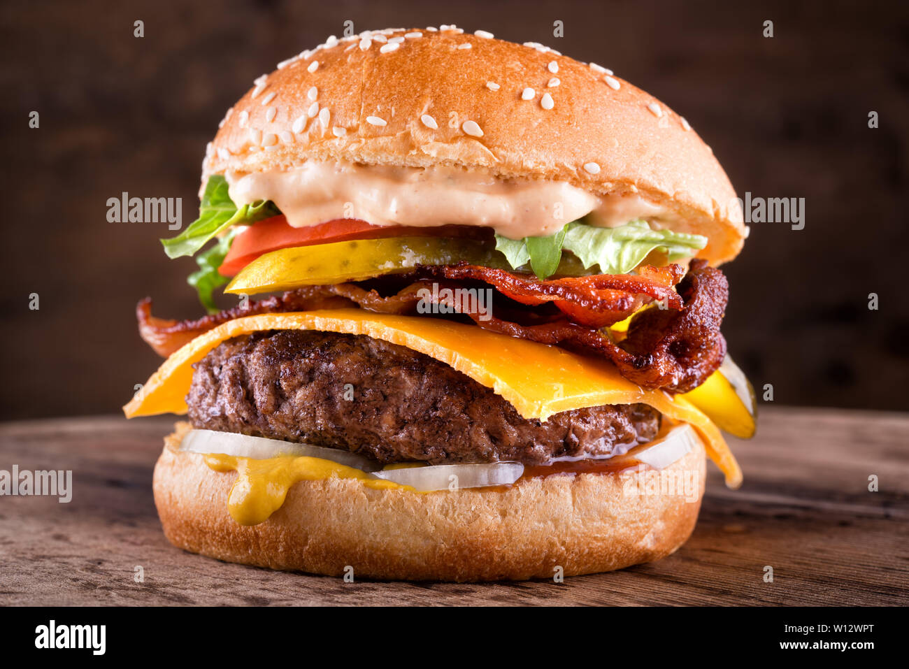 A delicious homemade bacon cheeseburger with real cheddar cheese