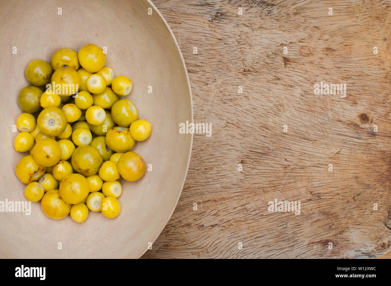 Fruits of Byrsonima crassifolia, an edible fruit of tropical America Stock Photo