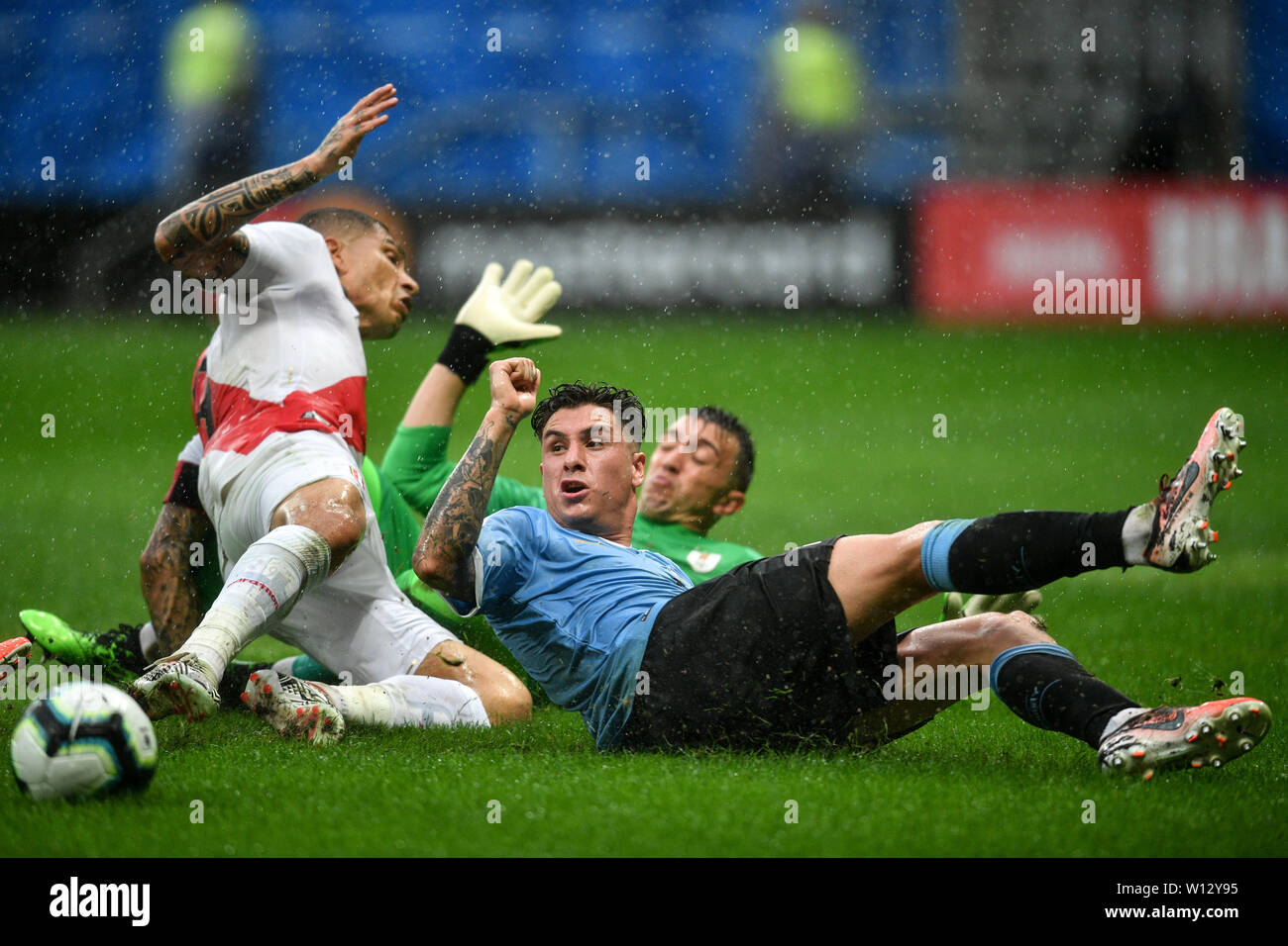 Salvador, Brazil. 29th June, 2019. Uruguay's Jose Maria Gimenez (R) vies with Paolo Guerrero (L) of Peru during the Copa America 2019 quarterfinal match between Uruguay and Peru in Salvador, Brazil, June 29, 2019. Peru won 5-4 in penalty shoot-out. Credit: Xin Yuewei/Xinhua/Alamy Live News Stock Photo