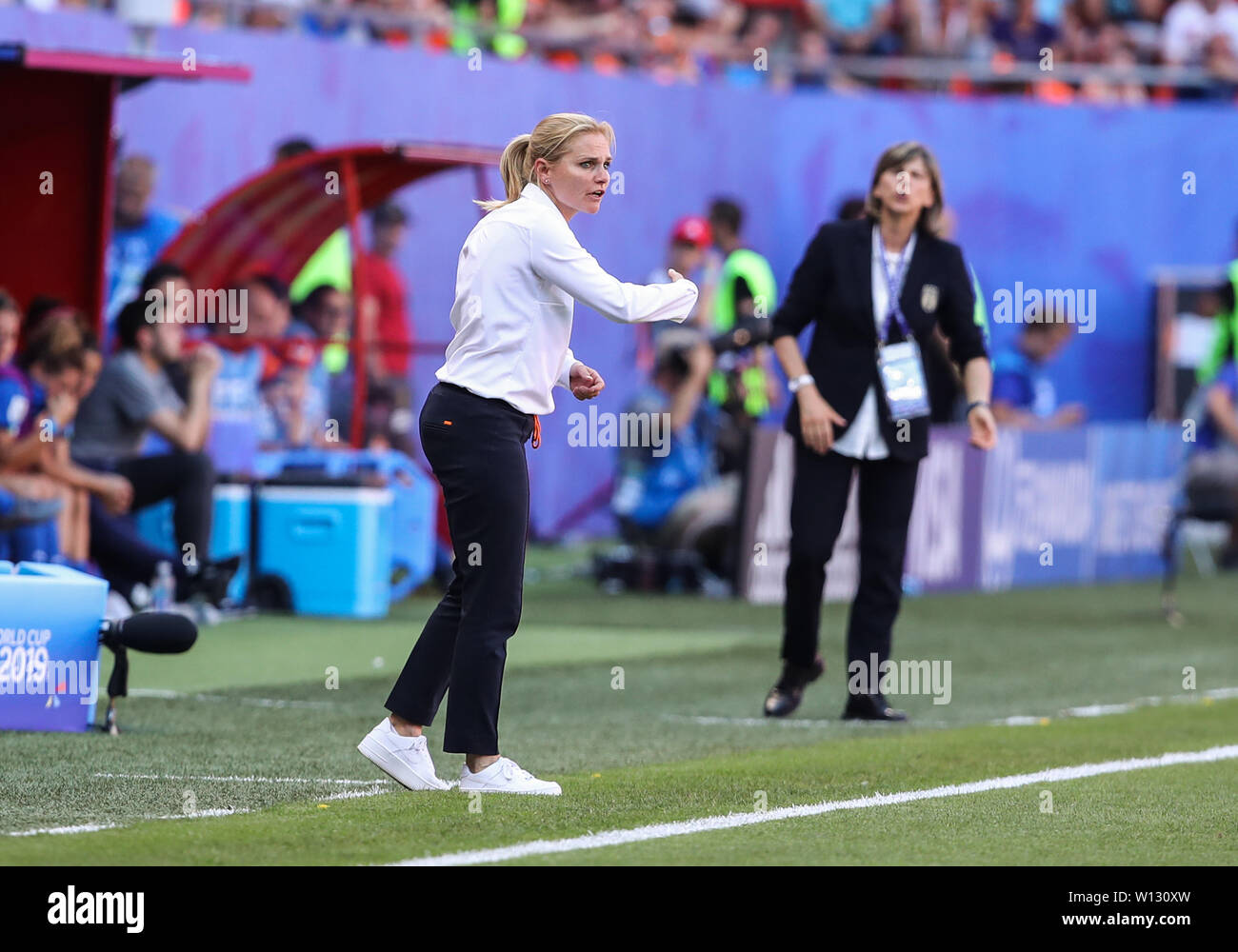 Valenciennes, France. 29th June, 2019. Sarina Wiegman (L), head coach of the Netherlands, gestures during the quarterfinal between Italy and the Netherlands at the 2019 FIFA Women's World Cup in Valenciennes, France, June 29, 2019. The Netherlands won 2-0. Credit: Shan Yuqi/Xinhua/Alamy Live News Stock Photo