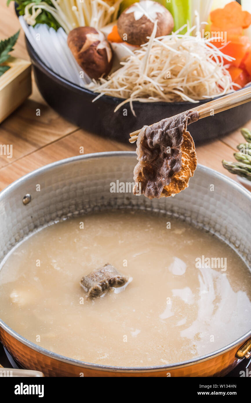Japanese beef hotpot with ingredients Stock Photo Alamy