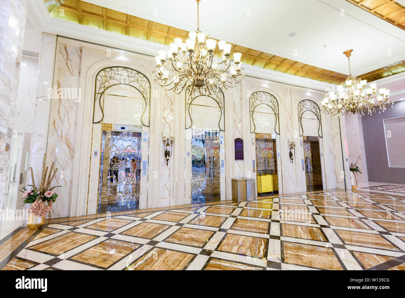 Elevator and decorations in hotel hall Stock Photo Alamy