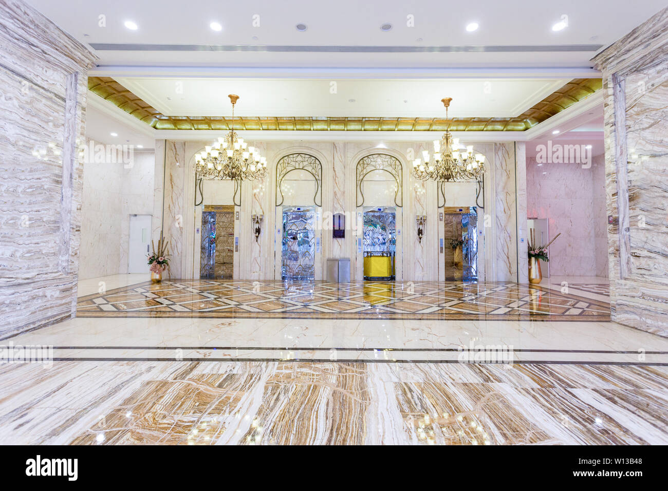 Elevator and decorations in hotel hall Stock Photo Alamy
