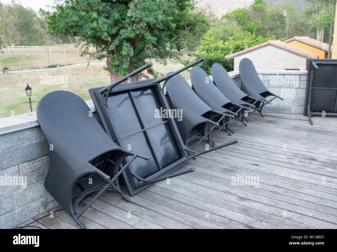 Black chair and table leaning keep neatly Stock Photo