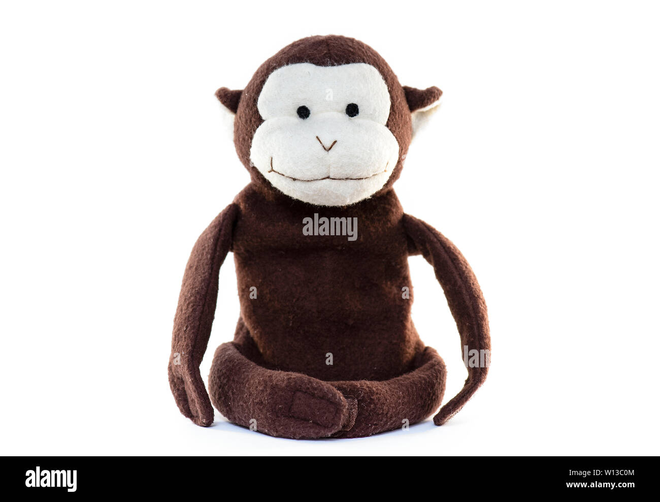 Old Monkey Doll Toy isolated on white Background Stock Photo