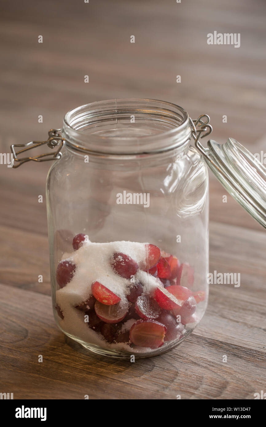 Make Natural Yeast Step 1 Cut half the grapes and fine granulated sugar