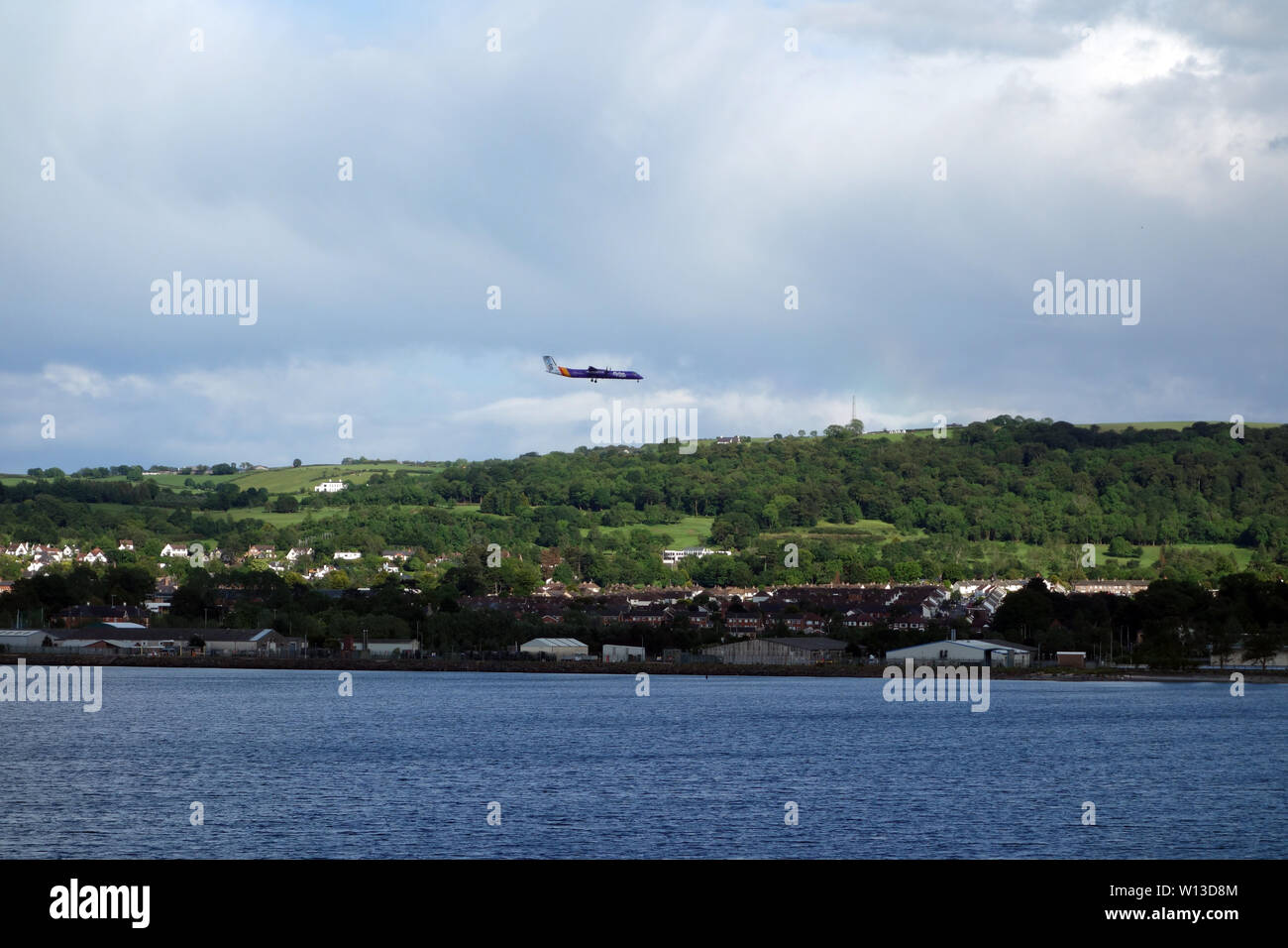 Flybe Bombardier Q400 Propeller Plane Landing at George Best City Airport, Belfast, County Down, Northern Ireland, UK. Stock Photo