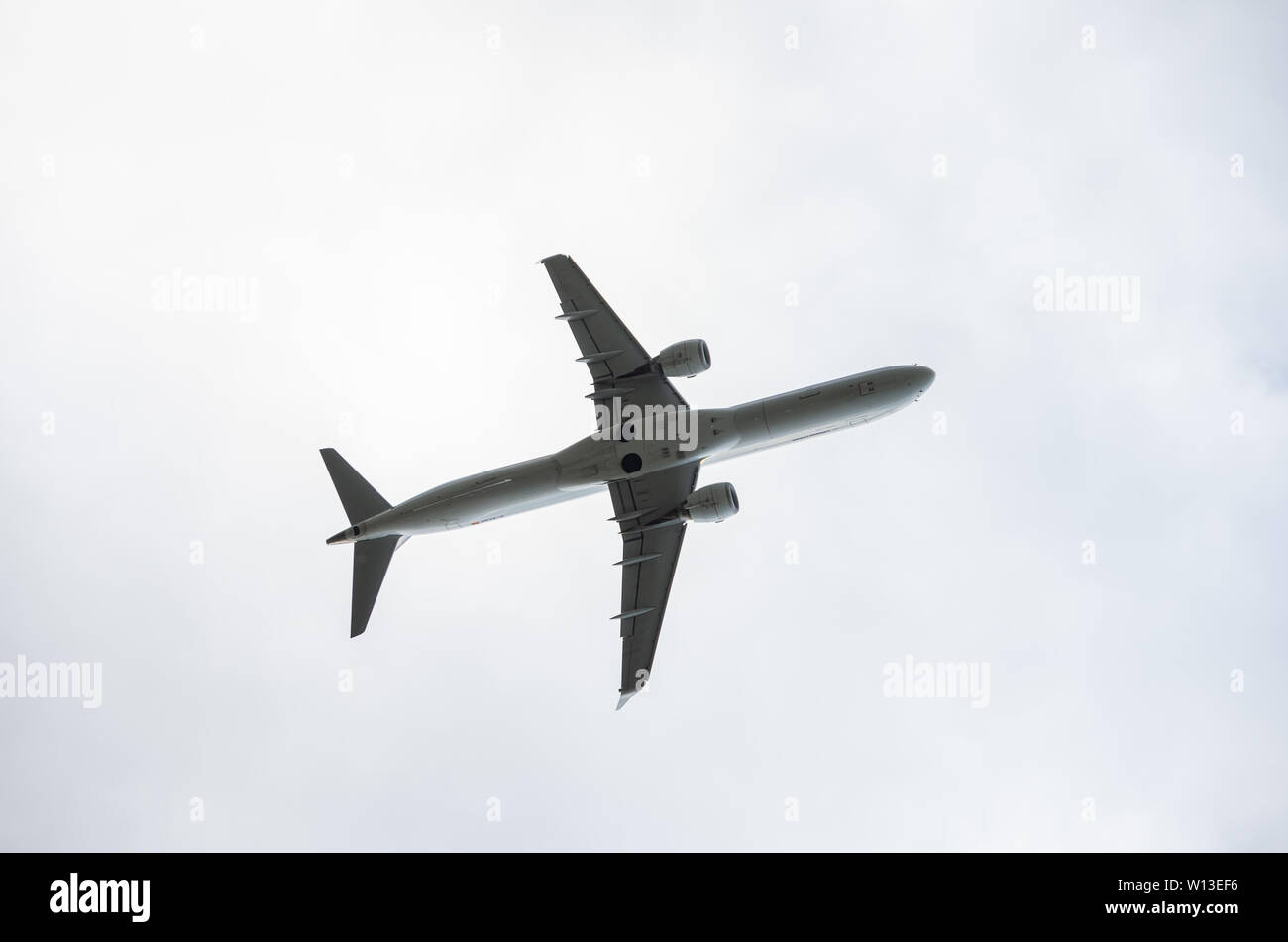 Embraer ERJ-195 Landing seen from bellow; Lufthansa Aircraft landing on Sofia international Airport Stock Photo