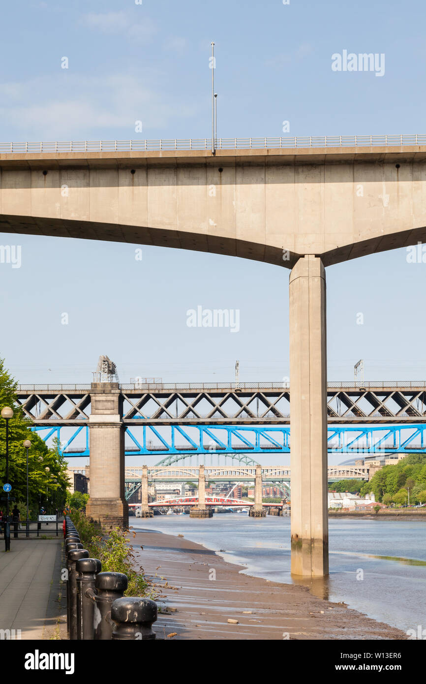 The view beneath Redheugh Bridge along the River Tyne.  The numerous bridges connect Newcastle upon Tyne and Gateshead. Stock Photo