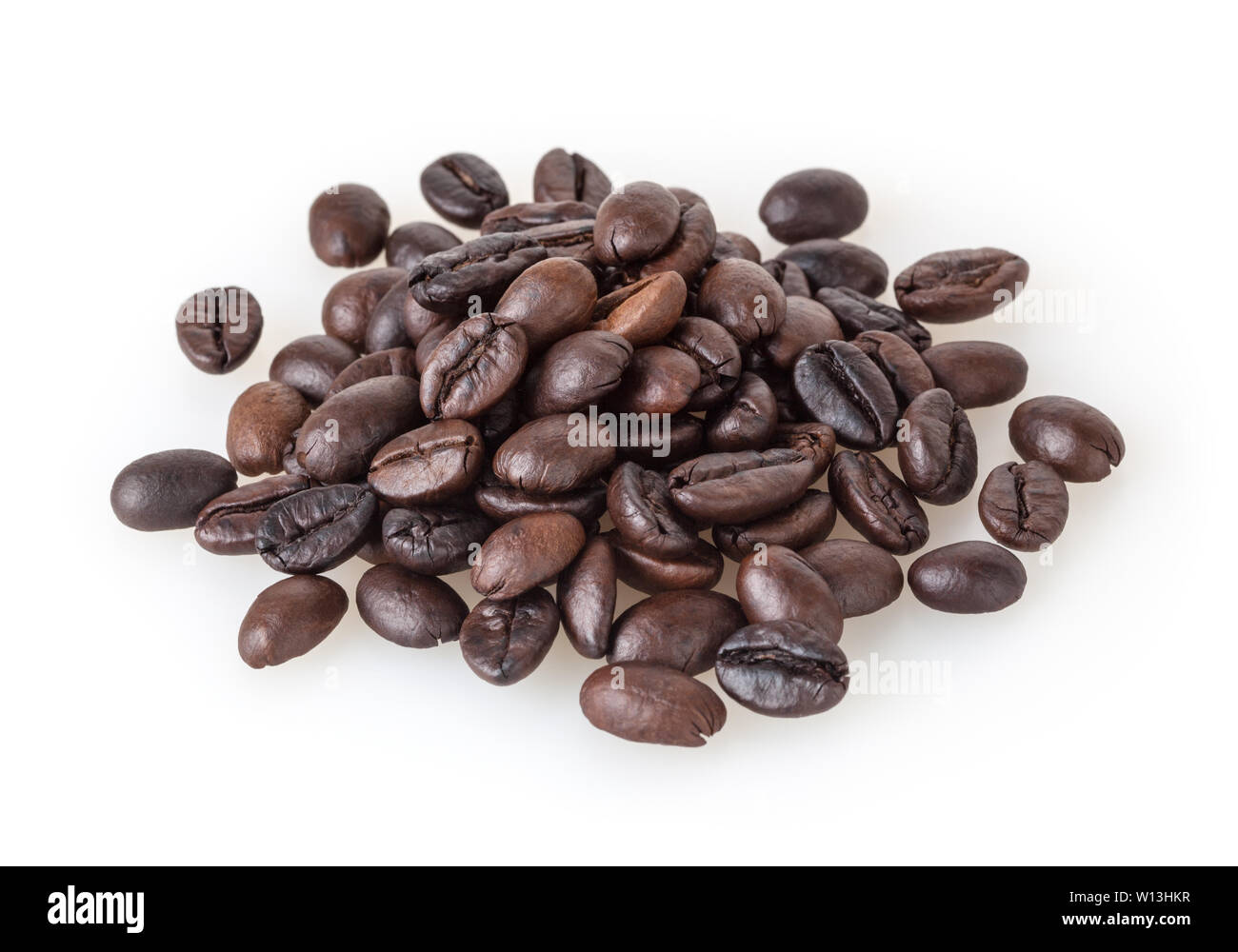 Heap of roasted coffee beans isolated on white background Stock Photo ...