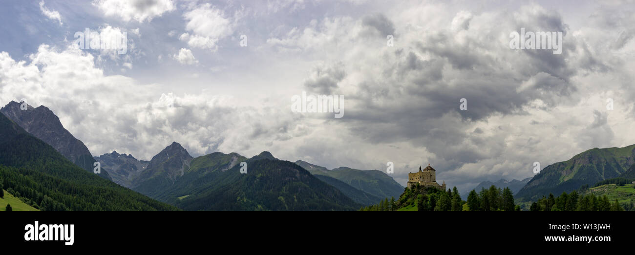 Panorama Landscape of the Lower Engadine Valley in the Swiss Alps with Tarasp Castle Stock Photo