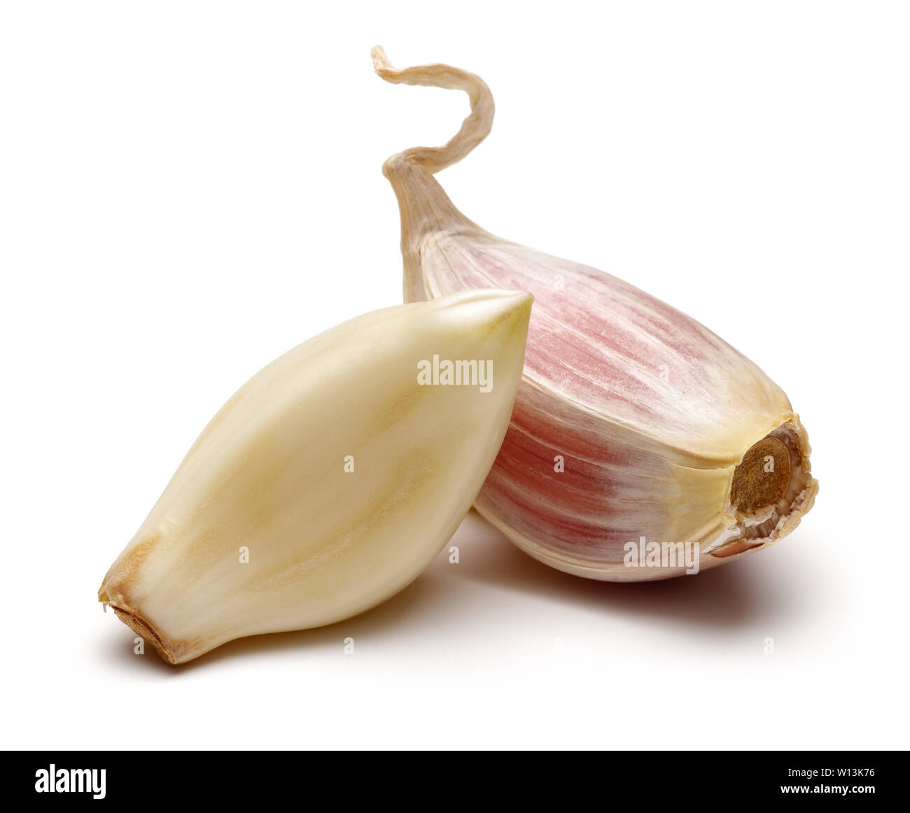 Garlic cloves isolated on white background Stock Photo - Alamy